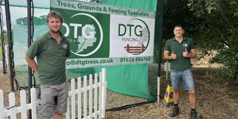 Devon Trees & Grounds Ltd team at fencing and grounds maintenance site.